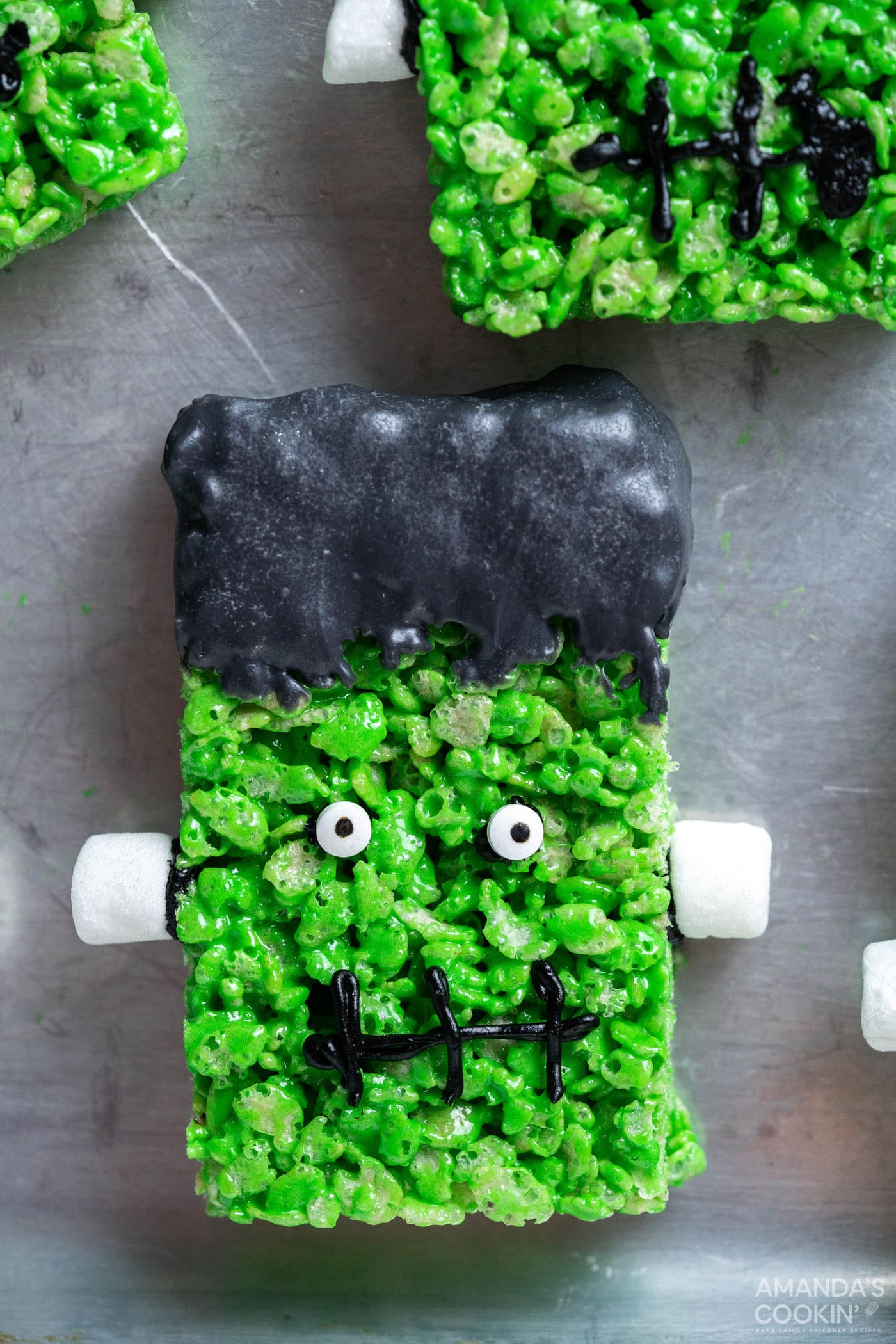 Frankenstein Rice Krispie Treats on a cookie sheet