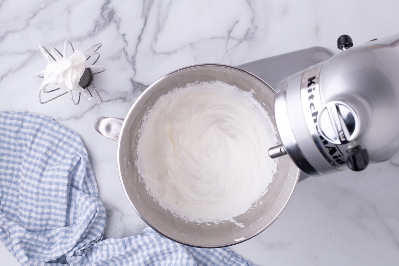 homemade whipped cream in a stand mixer bowl