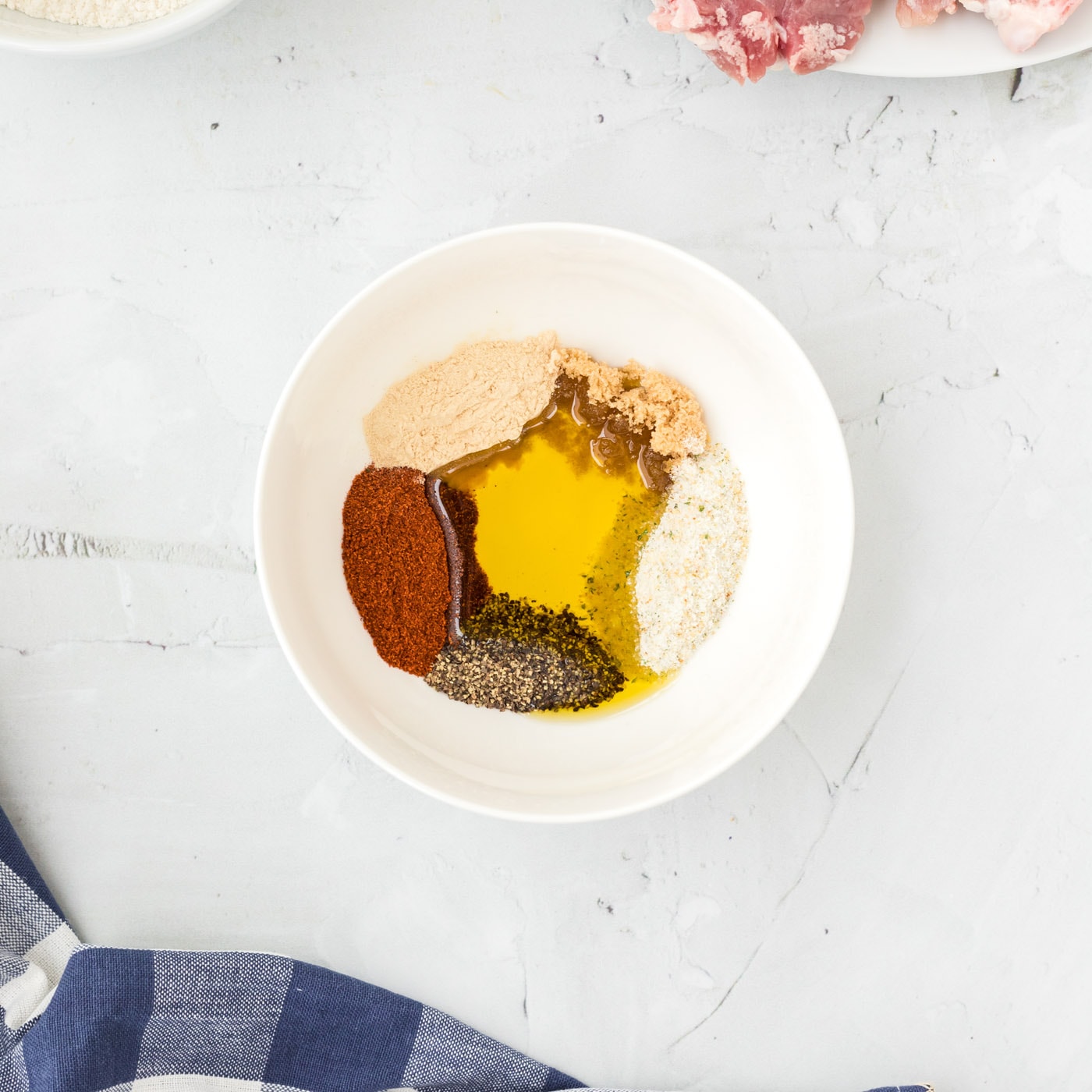olive oil with seasoning in a bowl