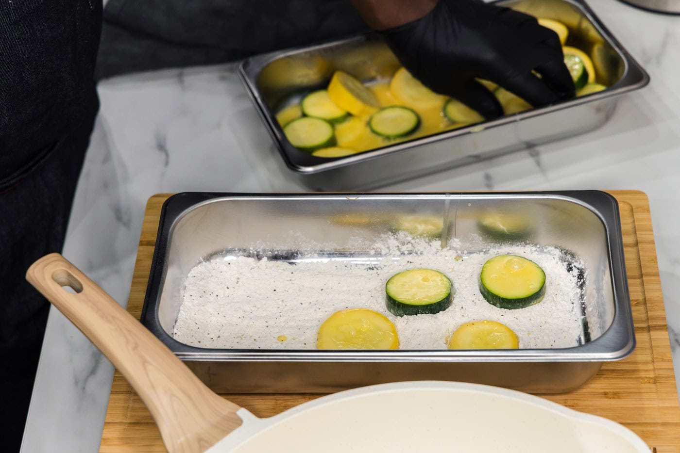 zucchini and yellow squash dipped in flour mixture