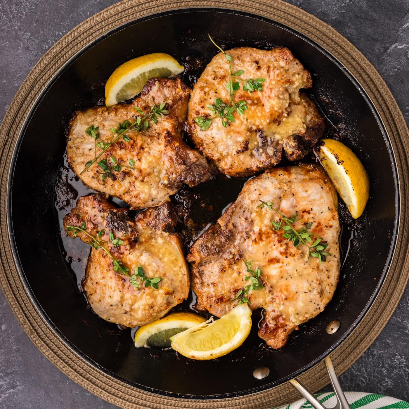 Garlic Butter Pork Chops in a skillet