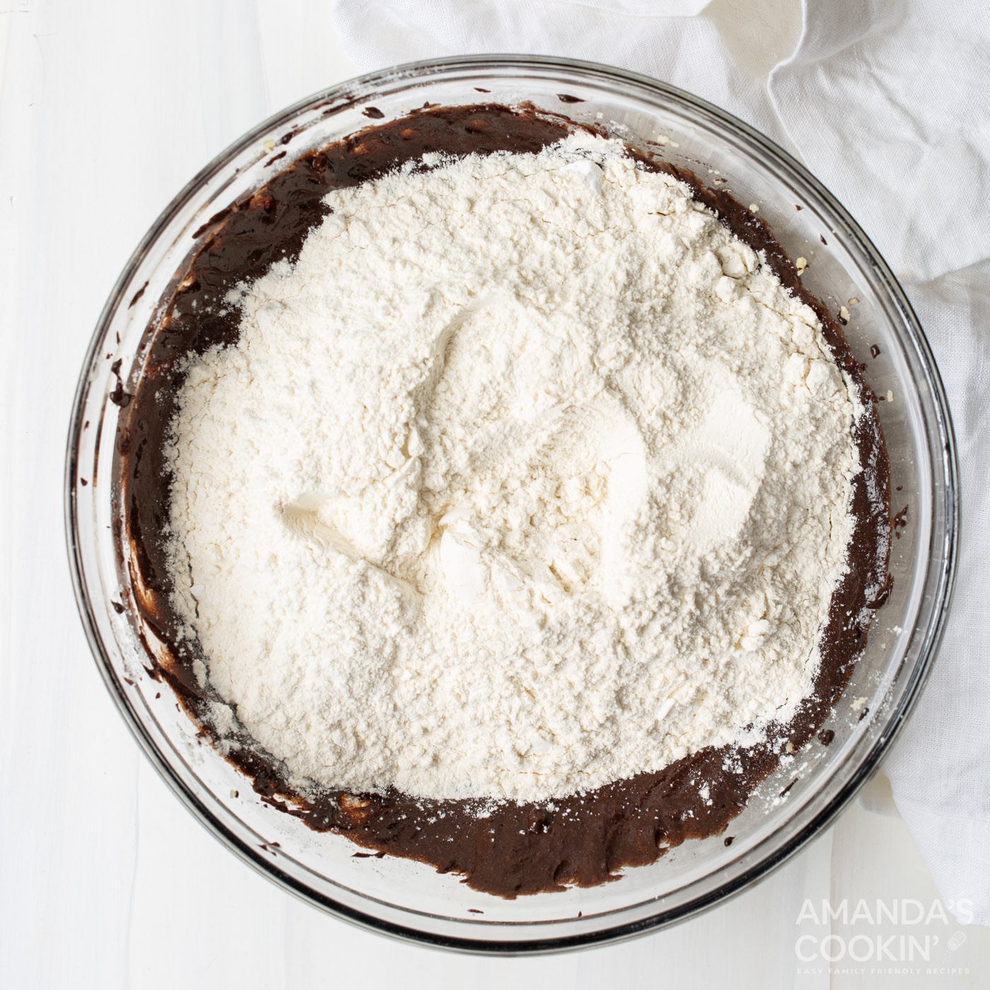 flour in a bowl of chocolate