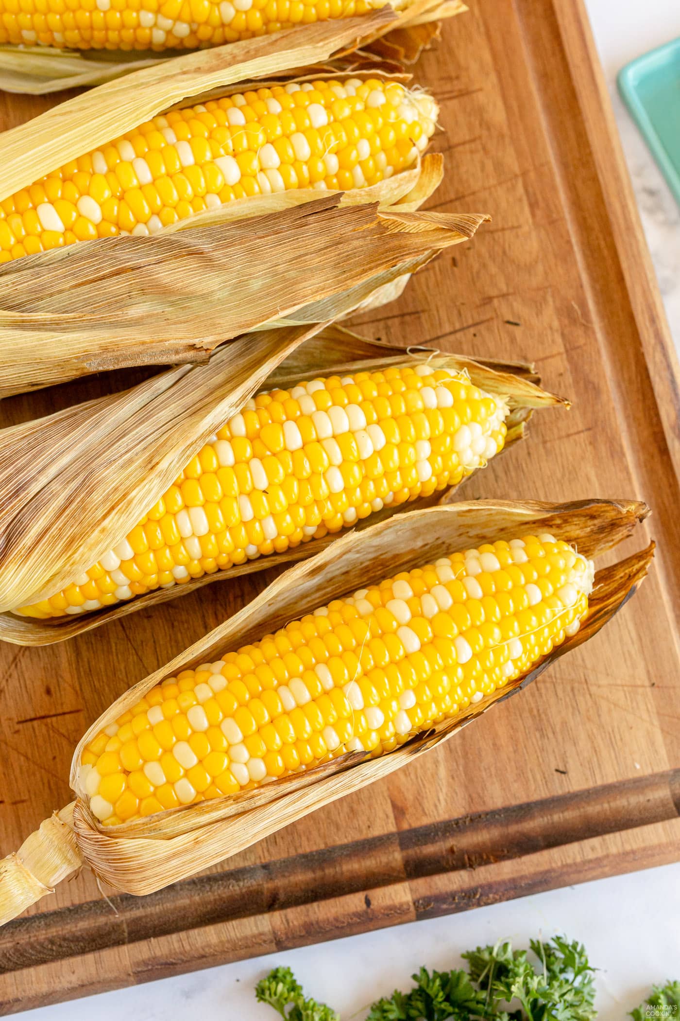 Grilled Corn on the Cob with husks on