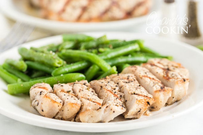 sliced pork chop on a plate