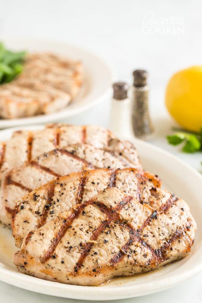 grilled pork chops on a platter
