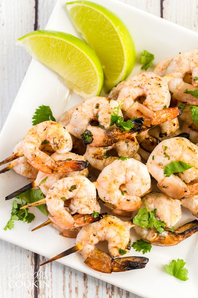 plate of skewered grilled shrimp