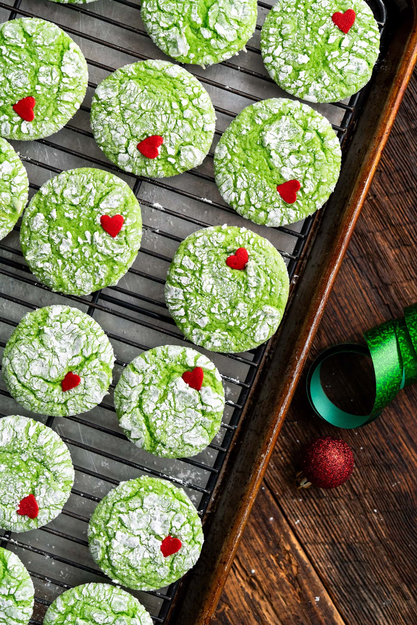 Grinch Cookies on a wire rack