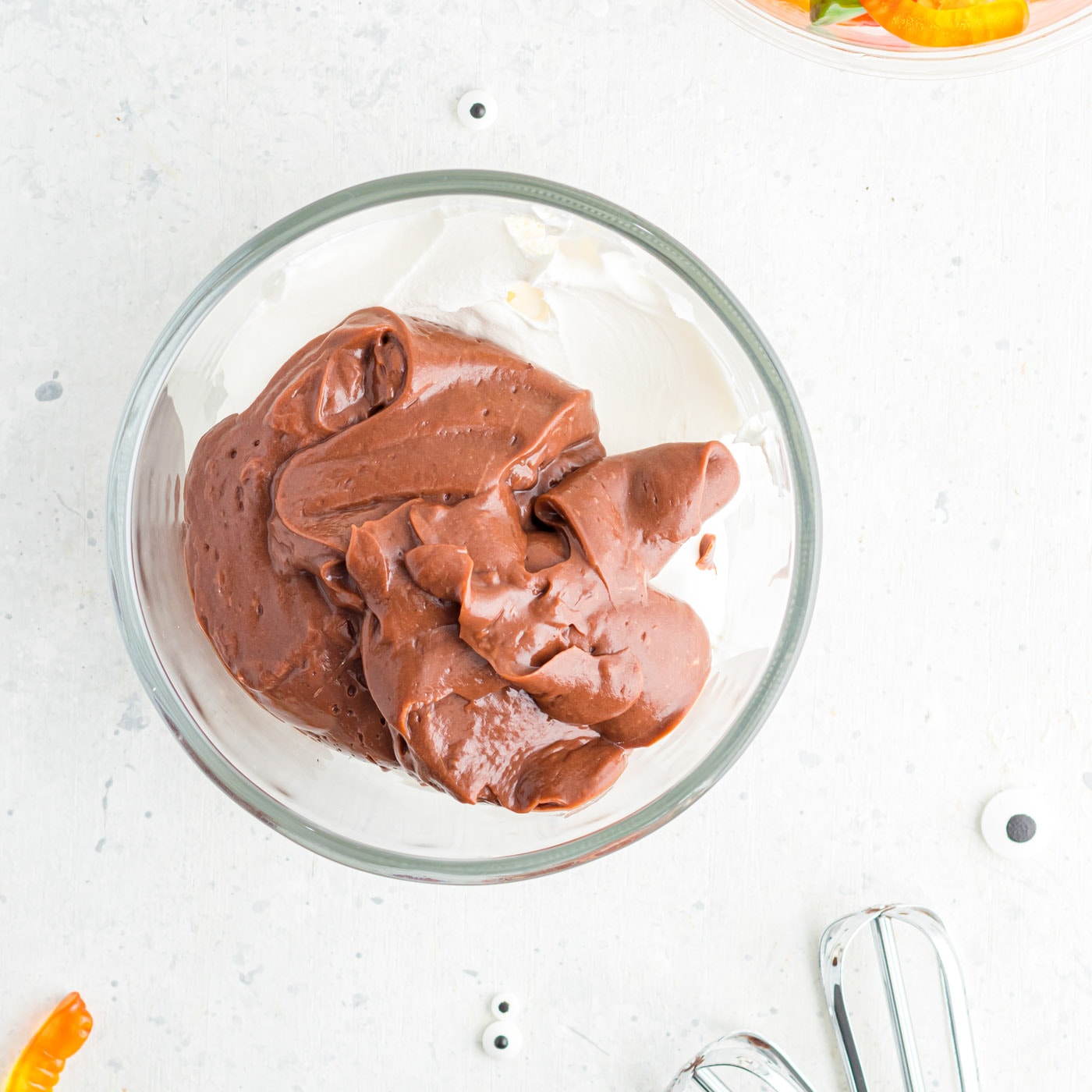 cool whip and chocolate pudding in a bowl