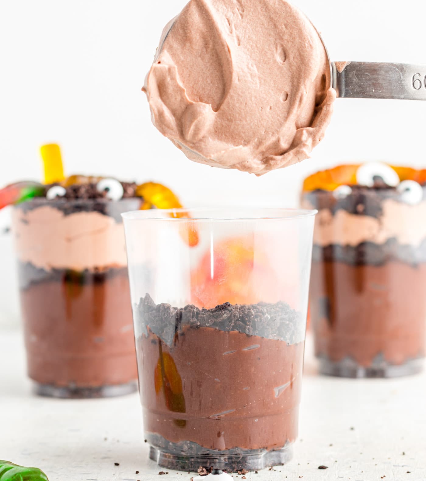 whipped chocolate pudding layer over crushed Oreo cookies