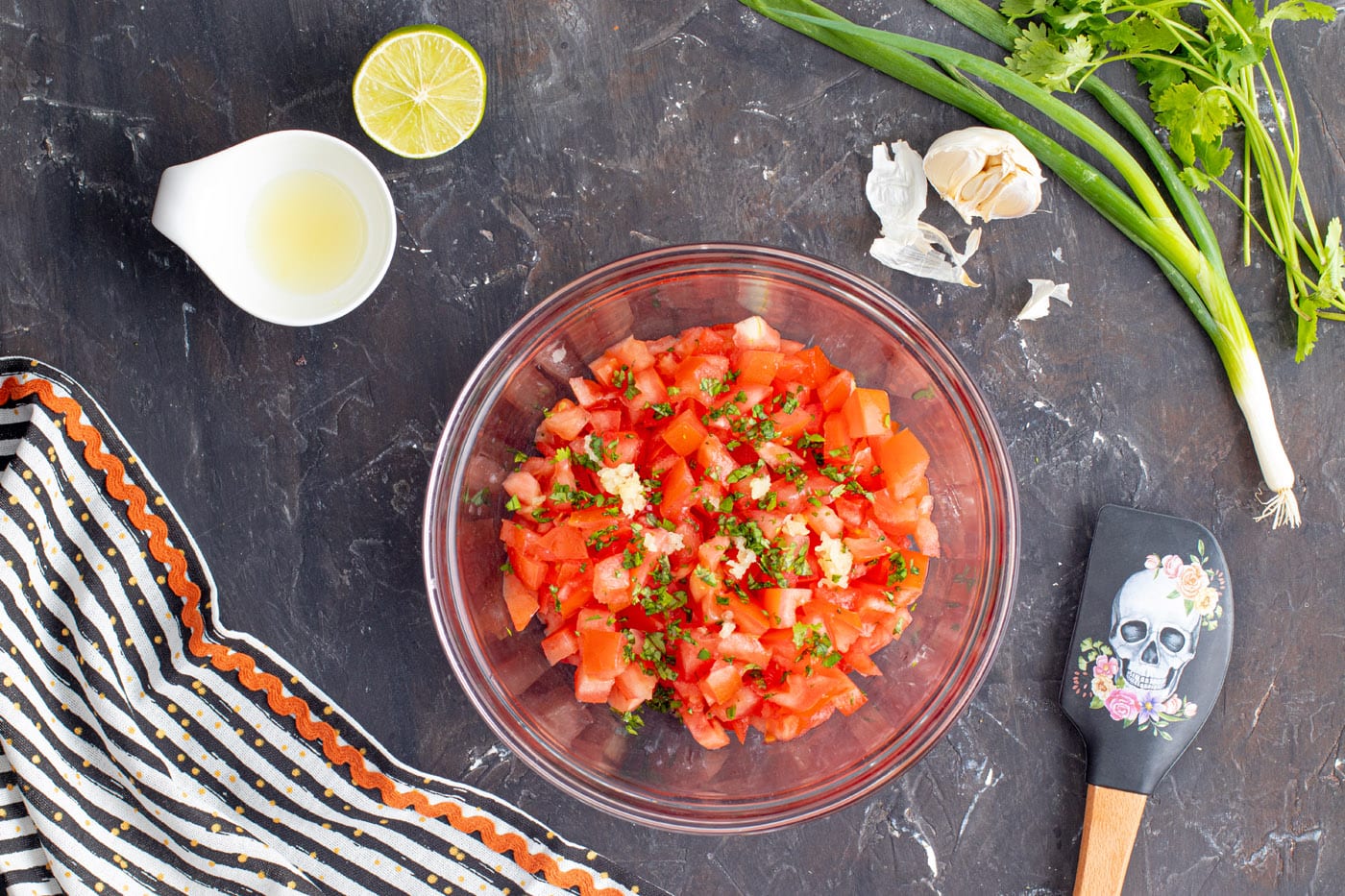pico de gallo ingredients in a mixing bowl