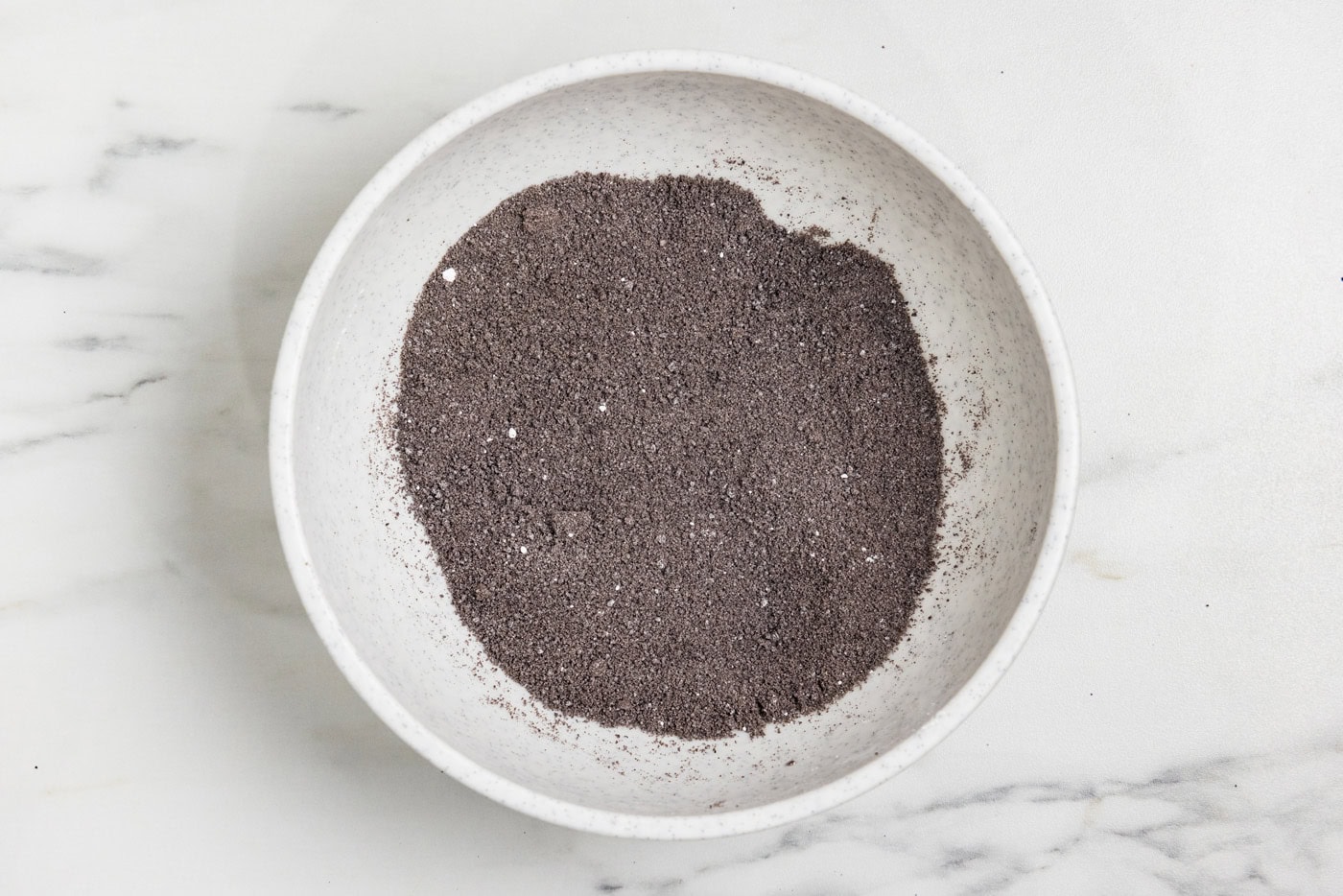 Oreo cookie crumbs mixed with powdered sugar