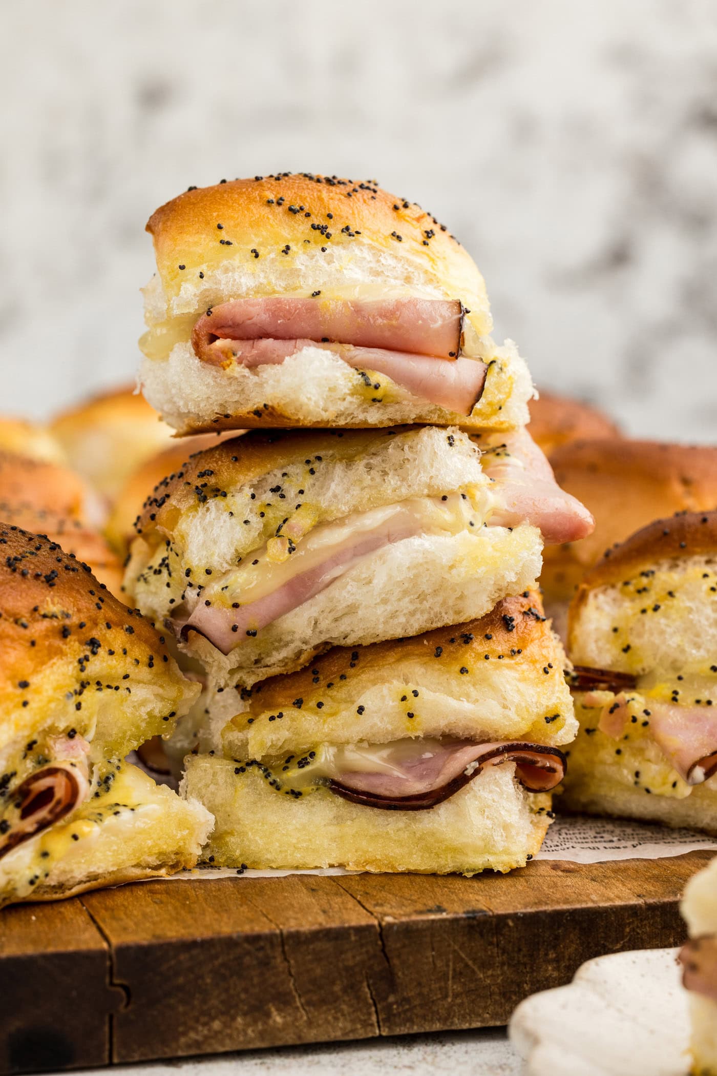 stack of ham and cheese slider sandwiches