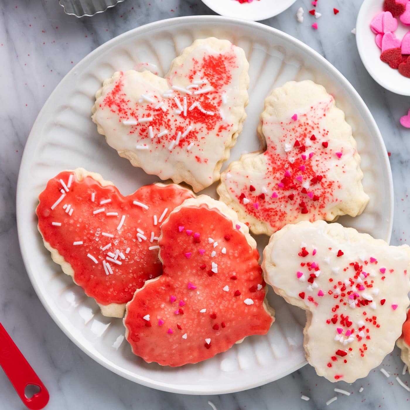 White plate covered with Heart Shaped Pop Tarts