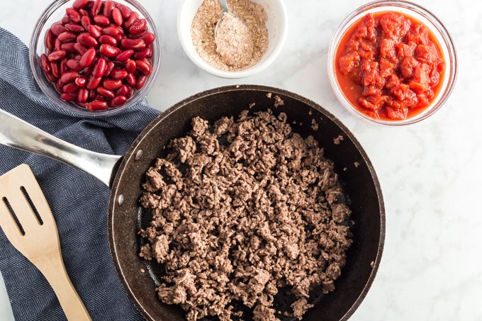 browned ground beef in a skillet