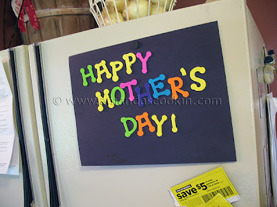 A photo of a happy mother\'s day sign made by one of my sons on the fridge.