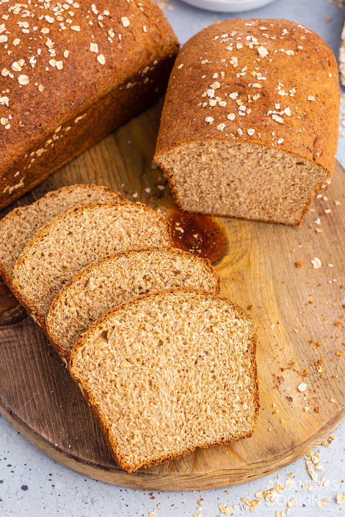 multigrain bread with slices on a wooden board