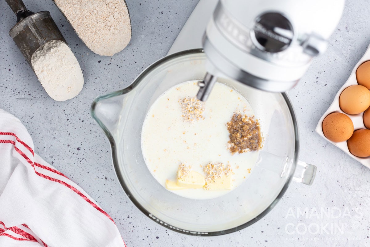 milk with bread ingredients in mixer bowl