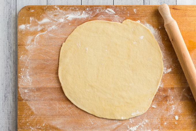 rolled out pizza dough