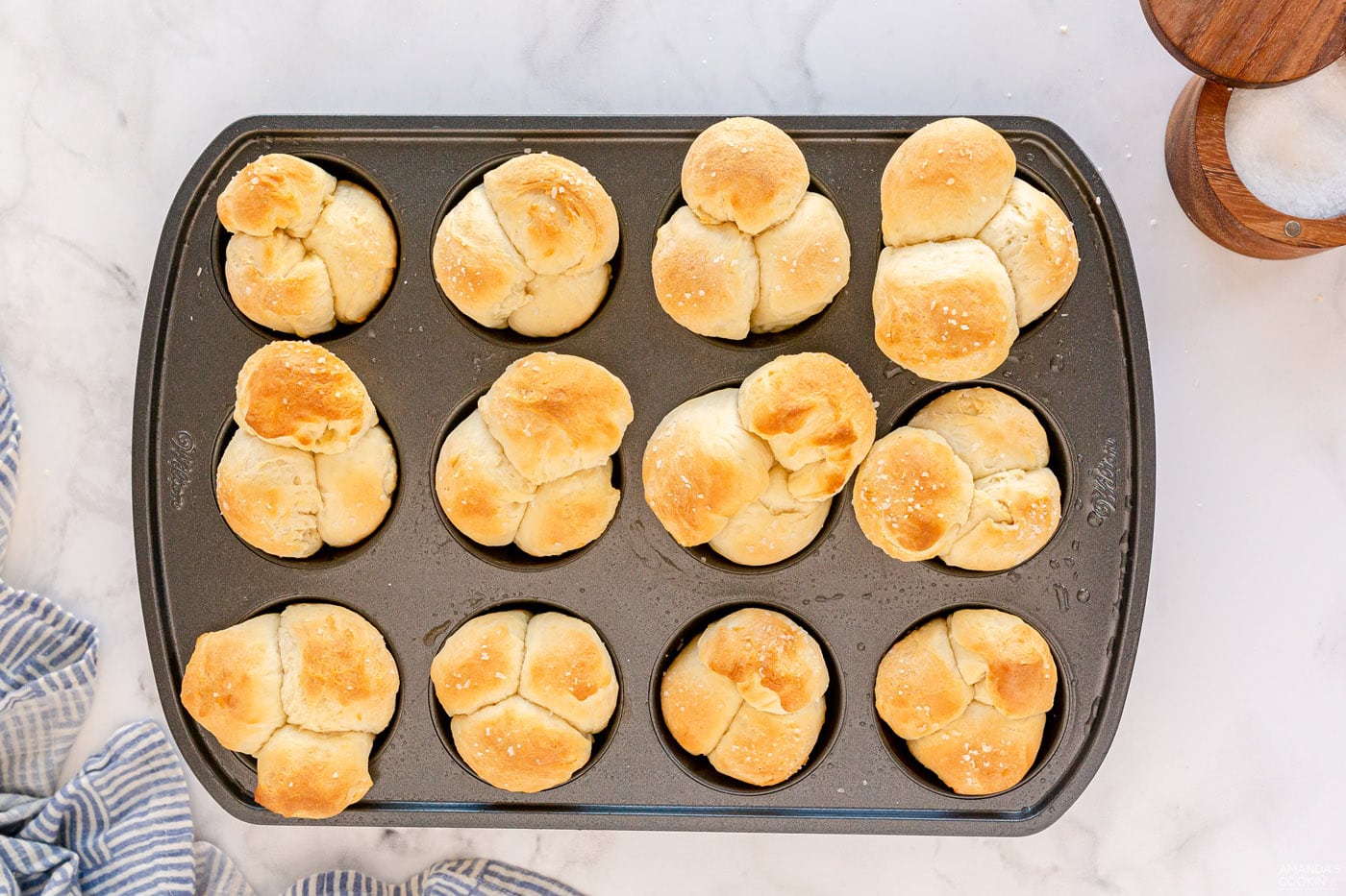 golden brown dinner rolls in pan