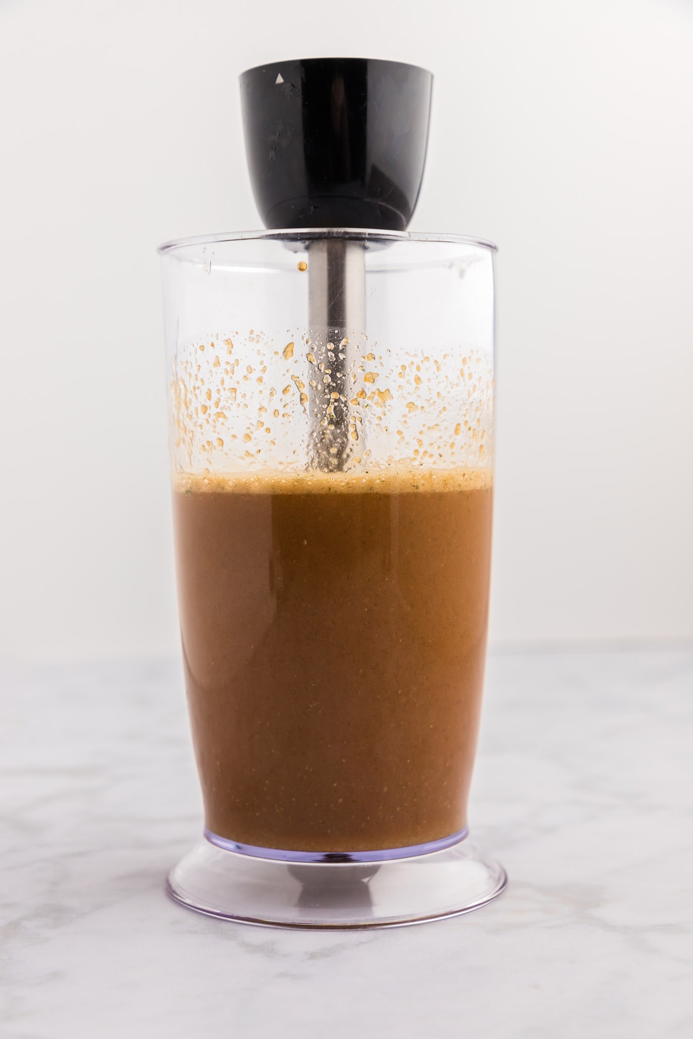 marinade ingredients in an immersion blender