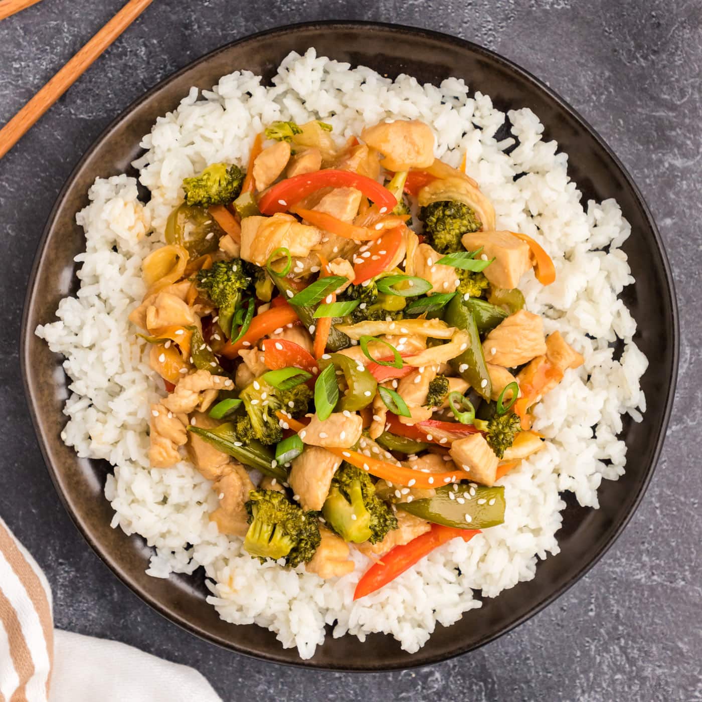Plate of Honey Garlic Chicken Stir Fry served over rice