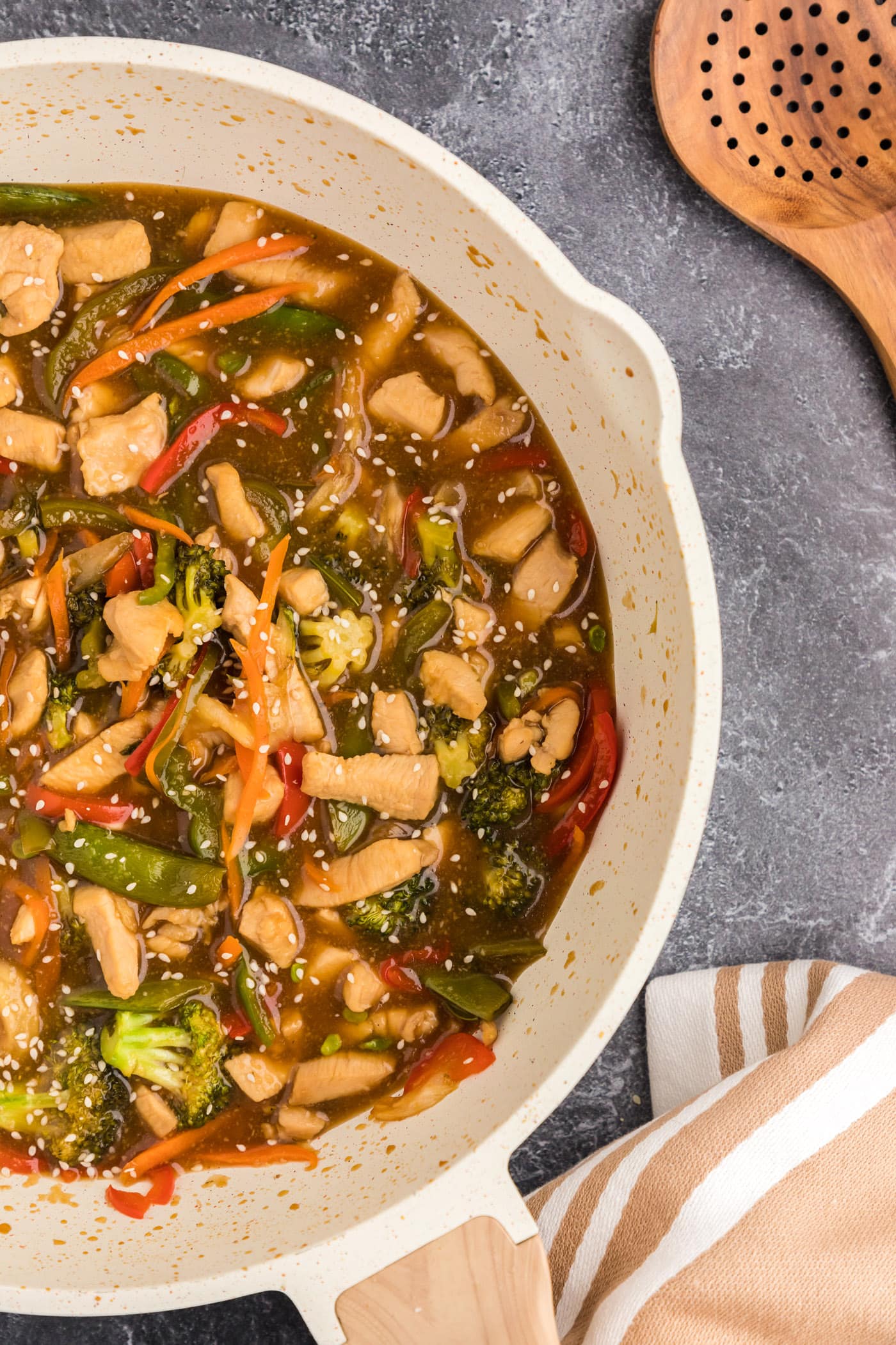 Photo of half of a skillet of Honey Garlic Chicken Stir Fry