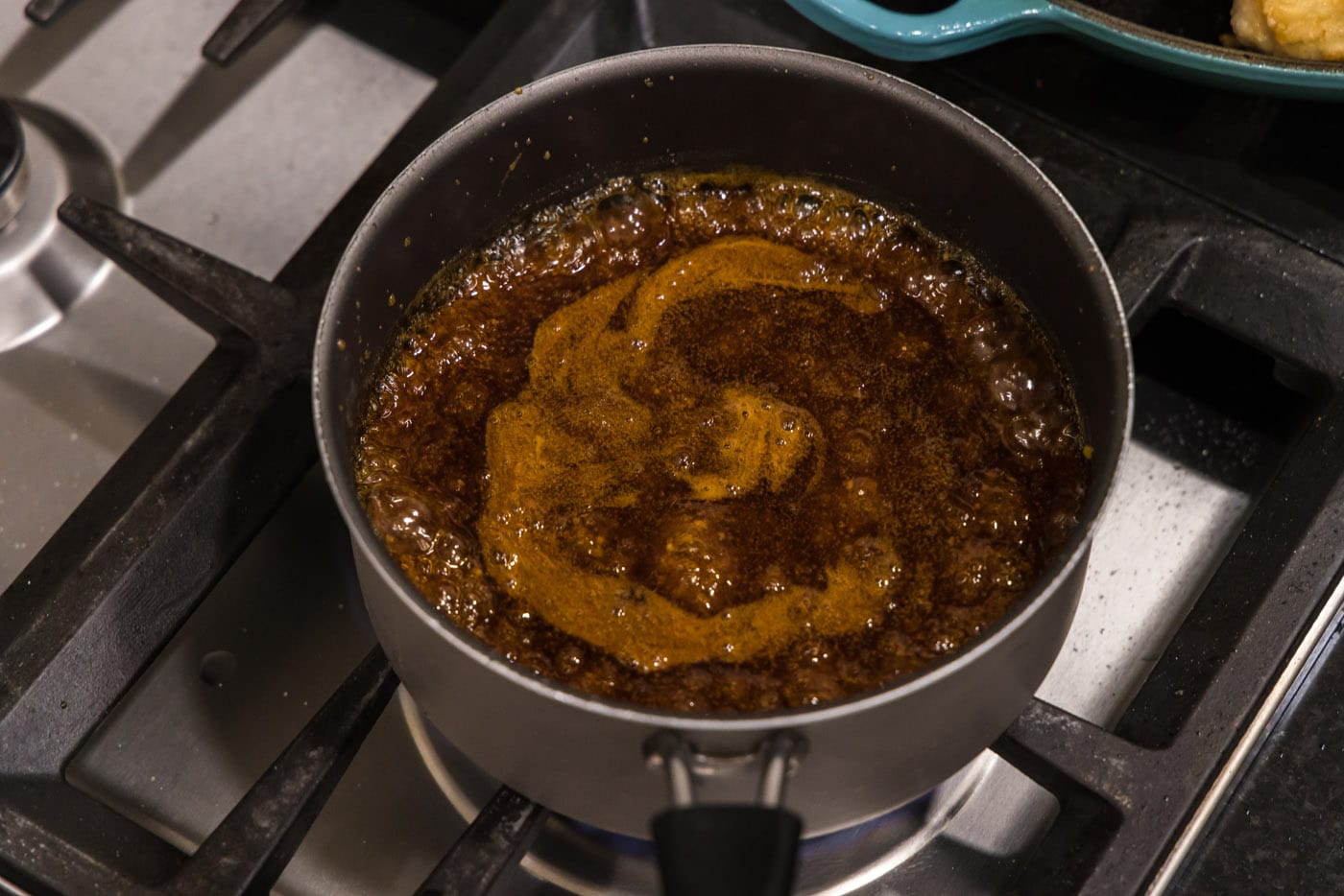 thickened honey garlic sauce in a pot