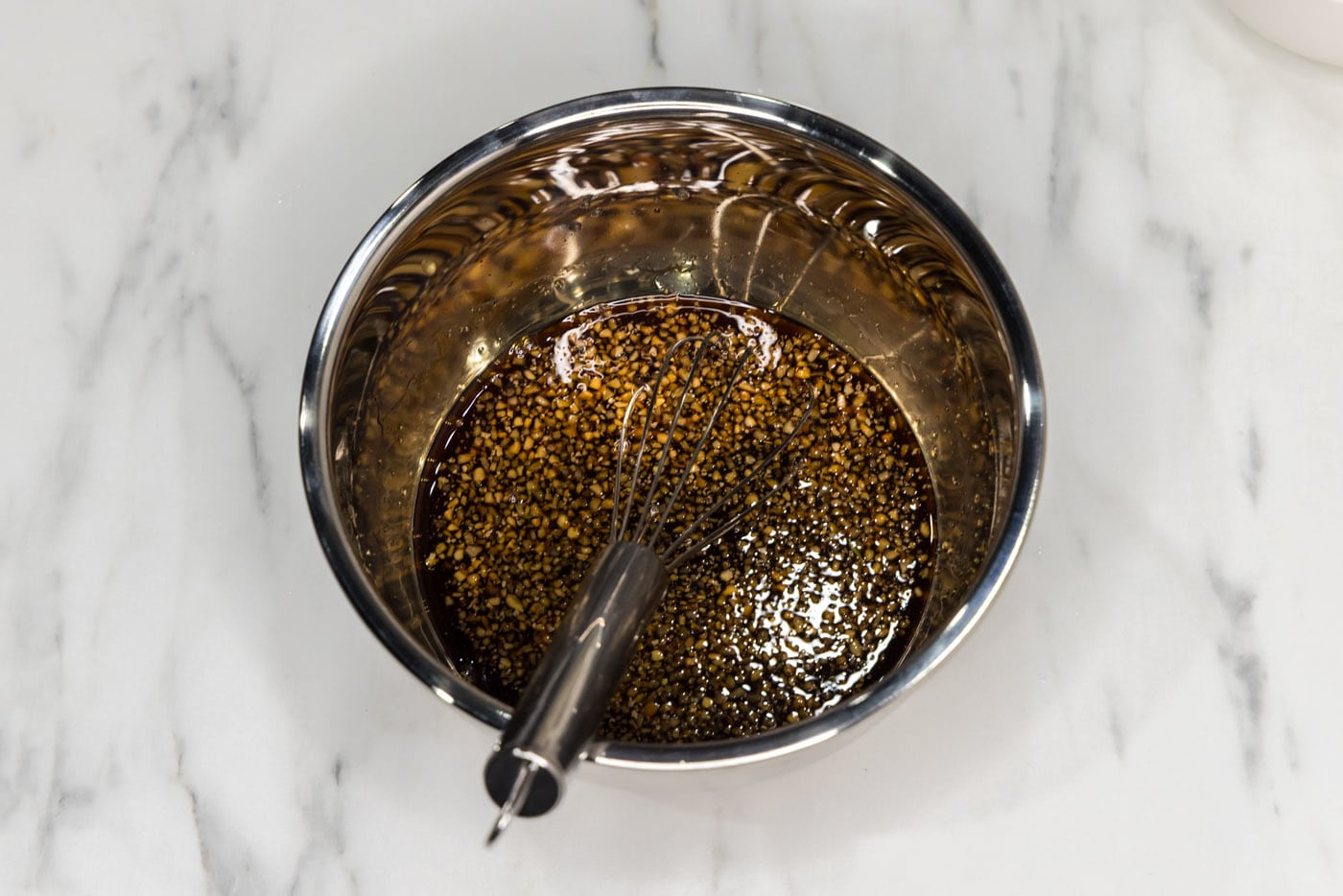 soy sauce, white wine vinegar, garlic, brown sugar, honey, and garlic salt whisked in a bowl