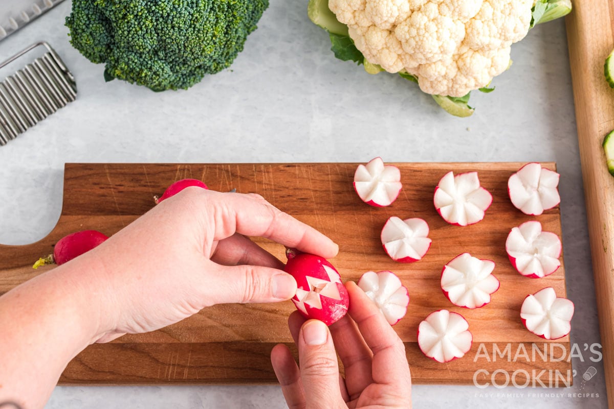 opening a radish flower after it was cut