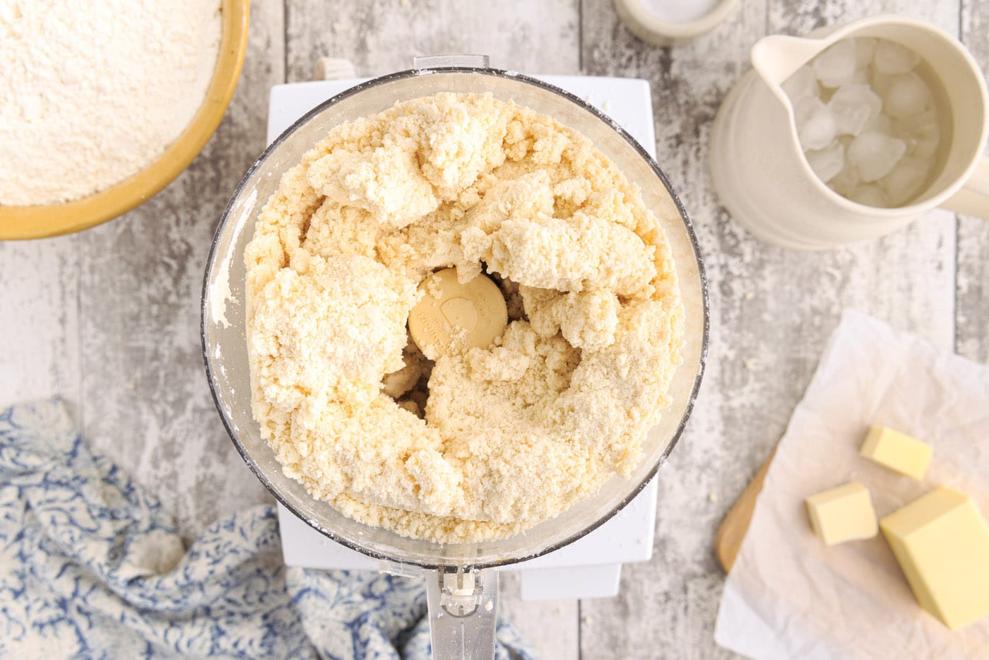 butter, water, and flour in a food processor clumped