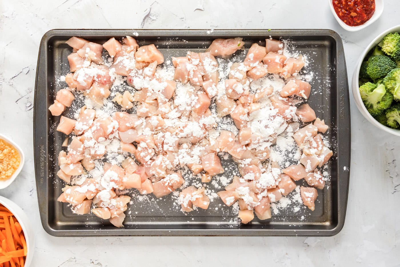 coating chicken pieces in cornstarch