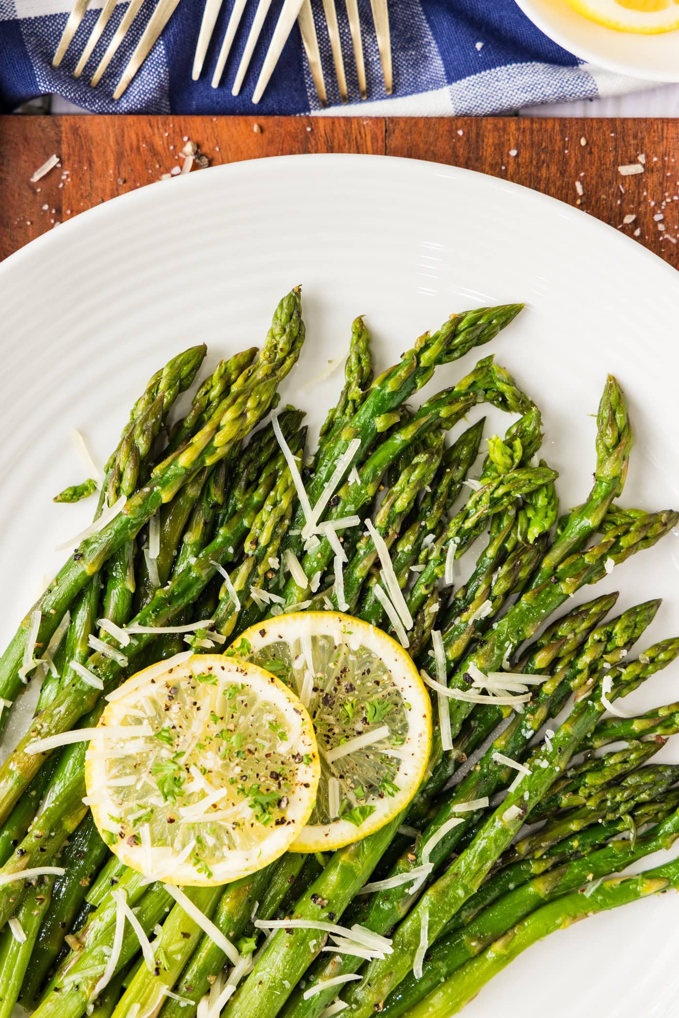 Close up photo of Instant Pot Asparagus topped with lemon slices