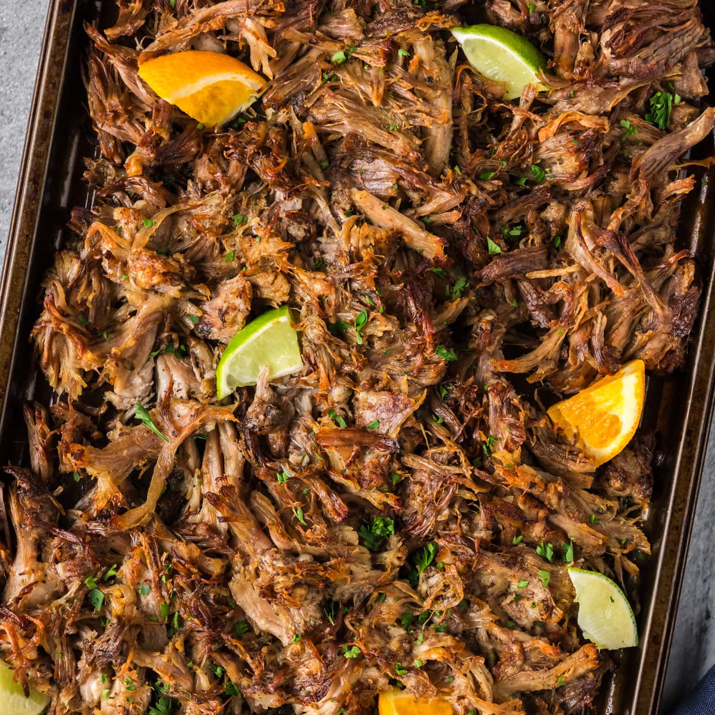 Close up photo of Instant Pot Carnitas on a sheet pan