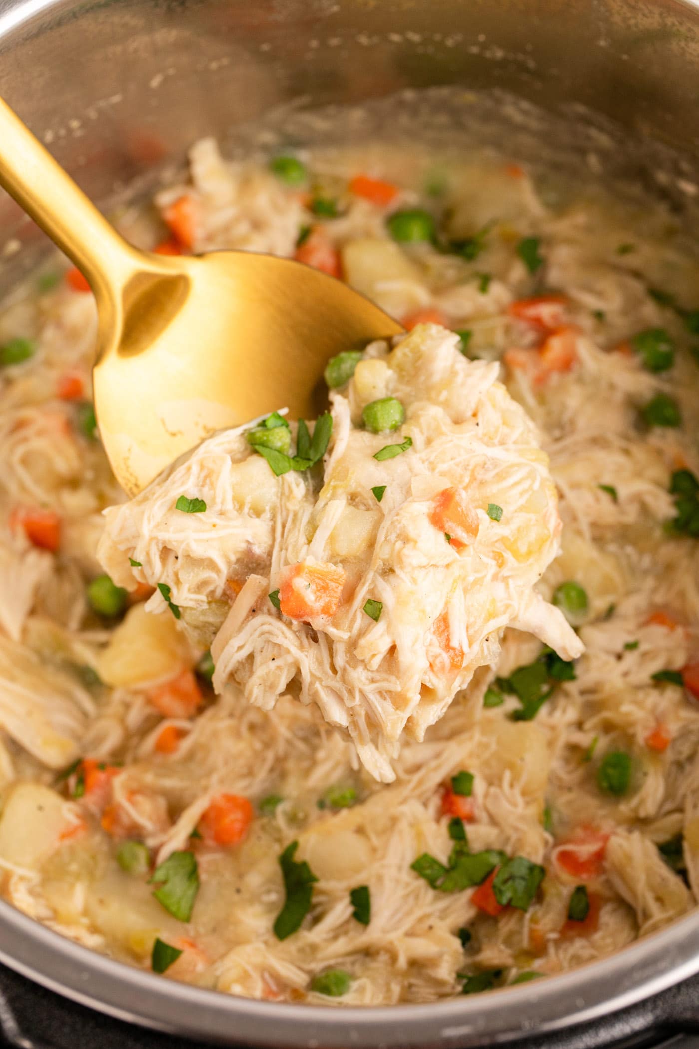 Close up photo of a spoonful of Instant Pot Chicken Pot Pie