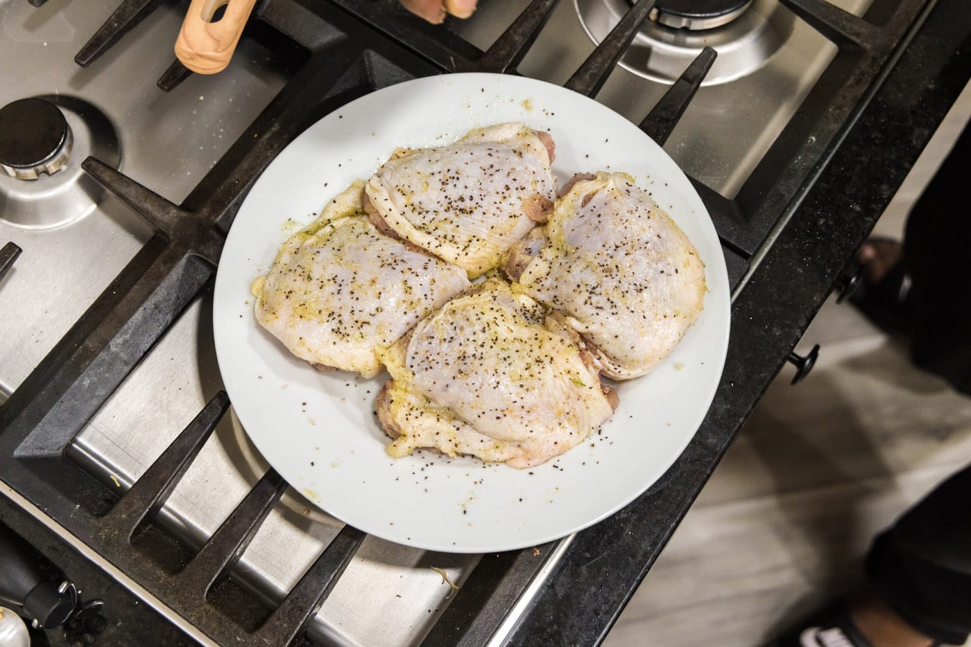 seasoned chicken thighs on a plate