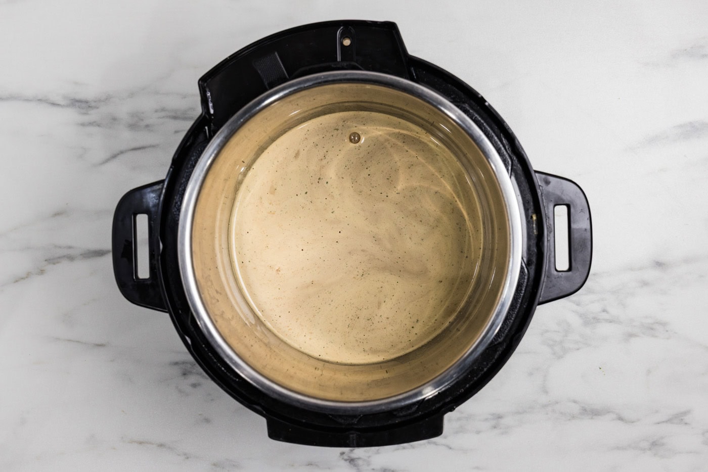 honey garlic sauce inside a pressure cooker