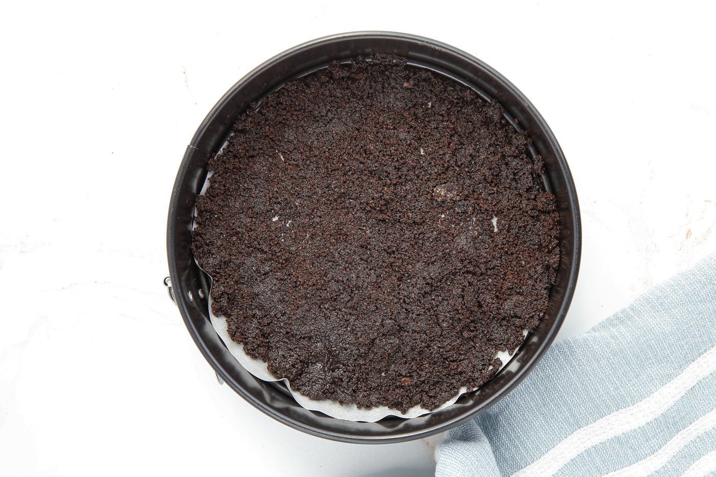 oreo cookie crust in springform pan
