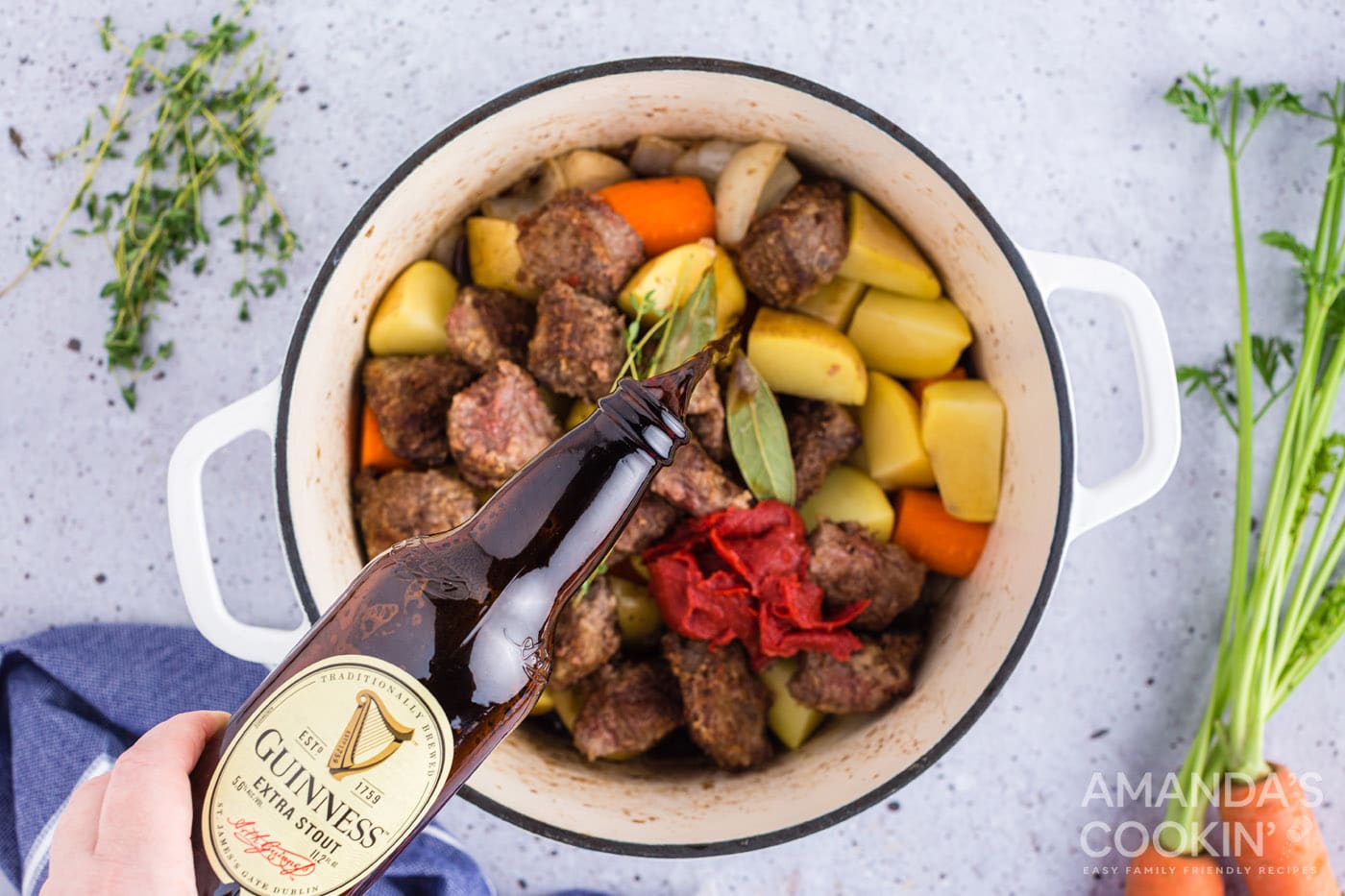 add beer and beef broth to pot with meat and veggies