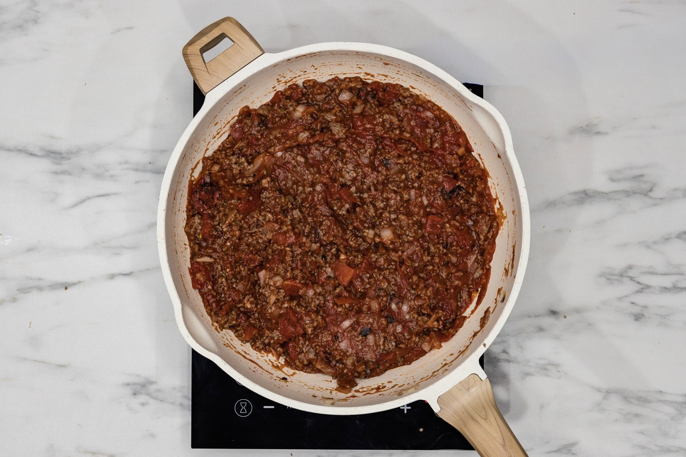 Lasagna meat sauce mixture in a skillet