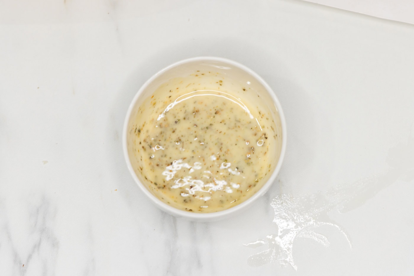 melted butter and seasoning mixture in a bowl