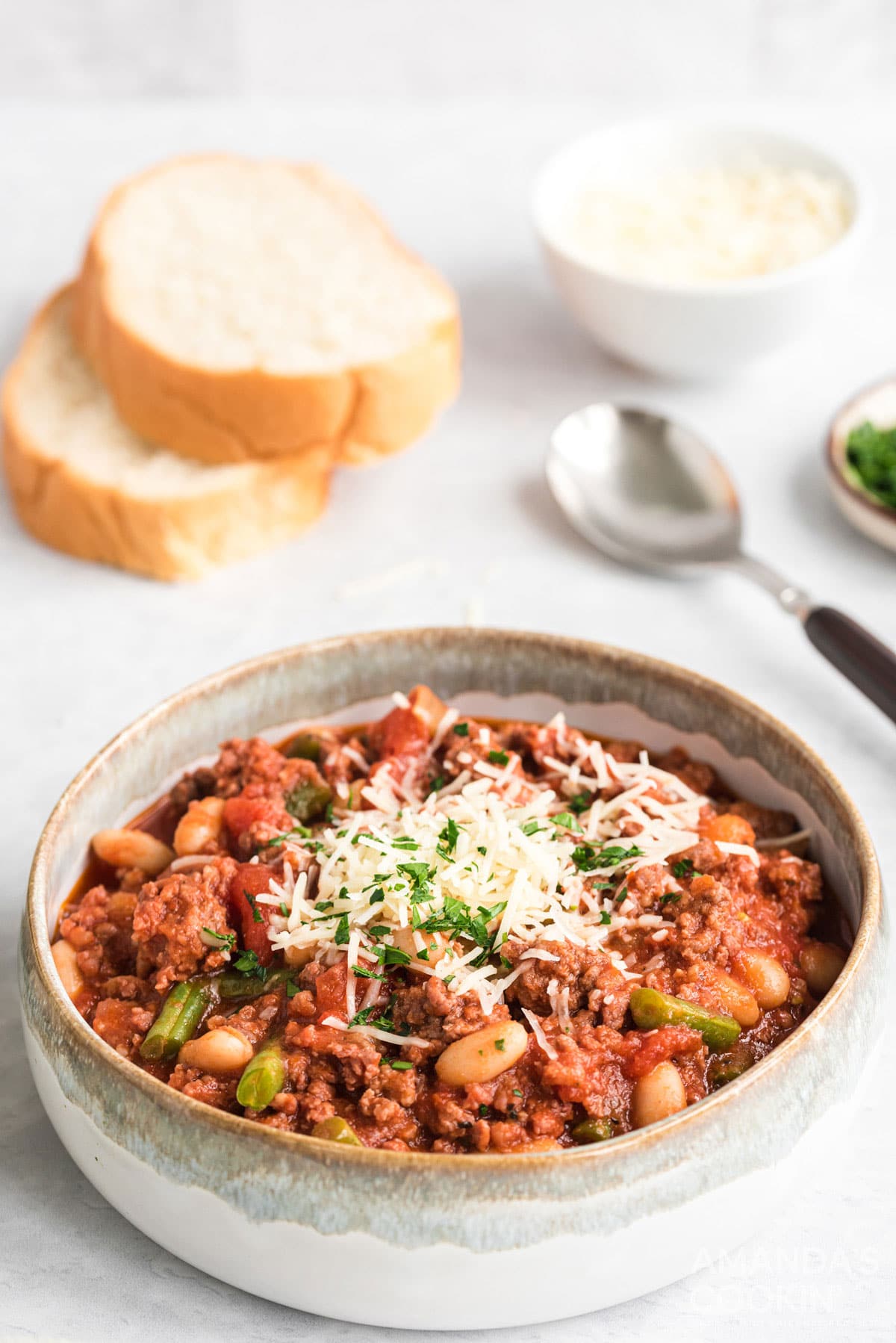 bowl of hamburger stew with bread slices