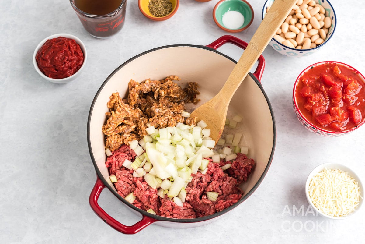pot with ground beef, italian sausage, and onion