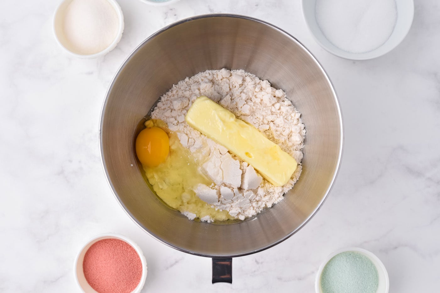 sugar cookie ingredients in a mixing bowl