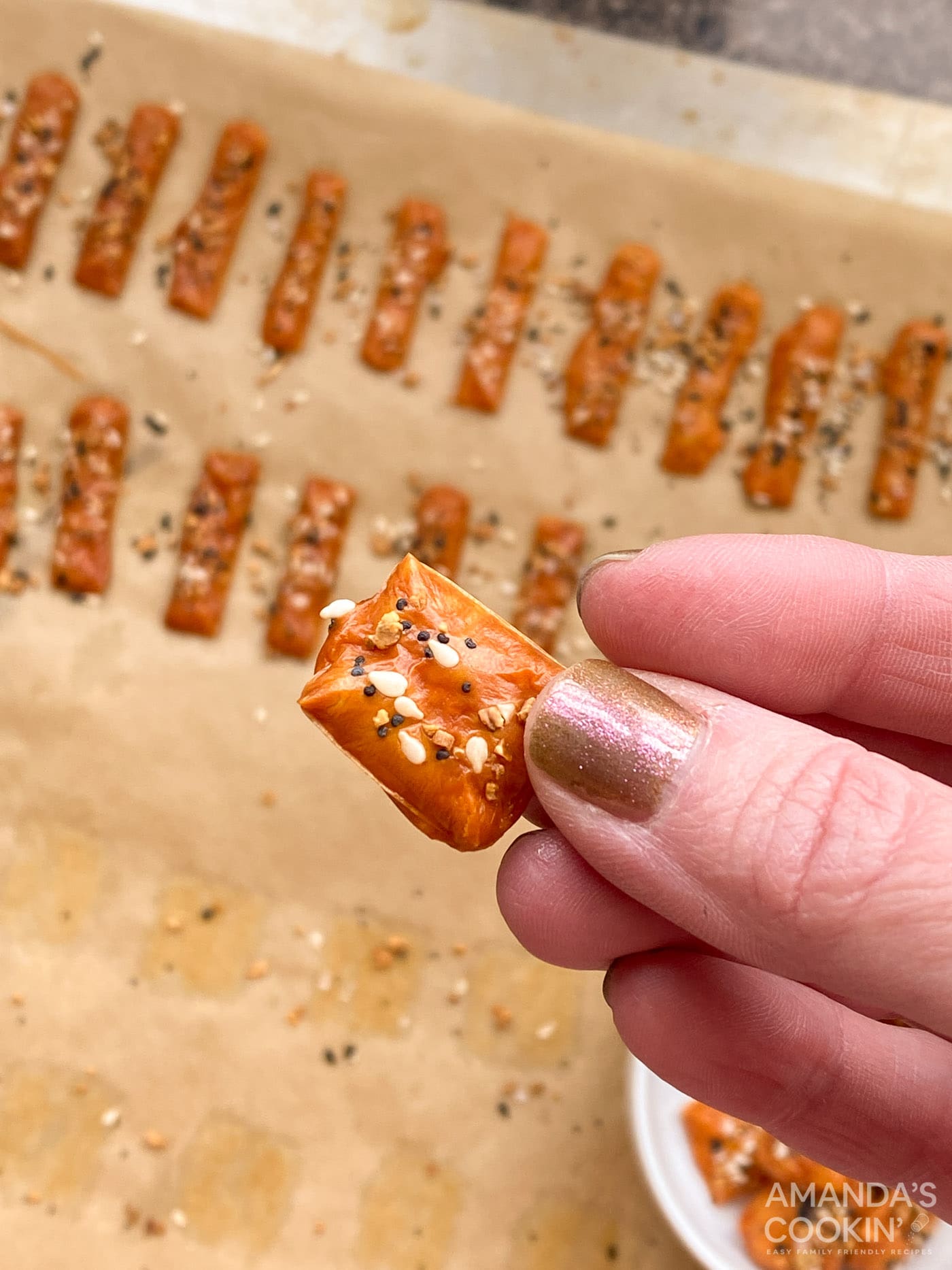 holding a keto cheese cracker