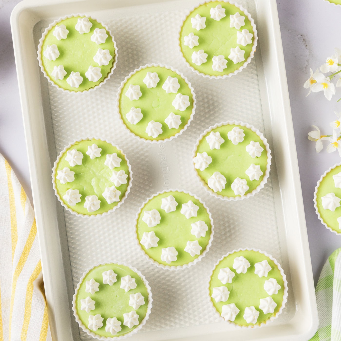 Close up photo of Keto Lime Cheesecake Bites on a baking sheet