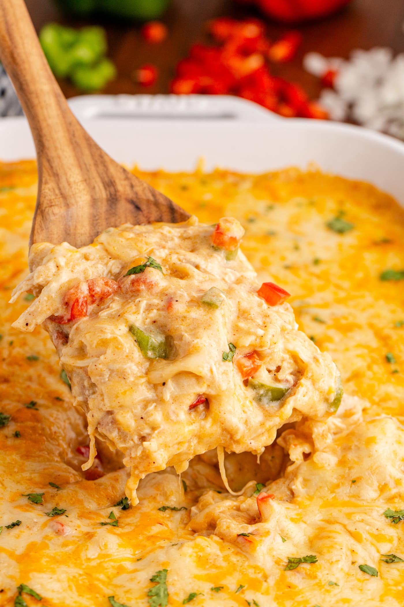 King Ranch Chicken Casserole being lifted out of the pan by a spatula