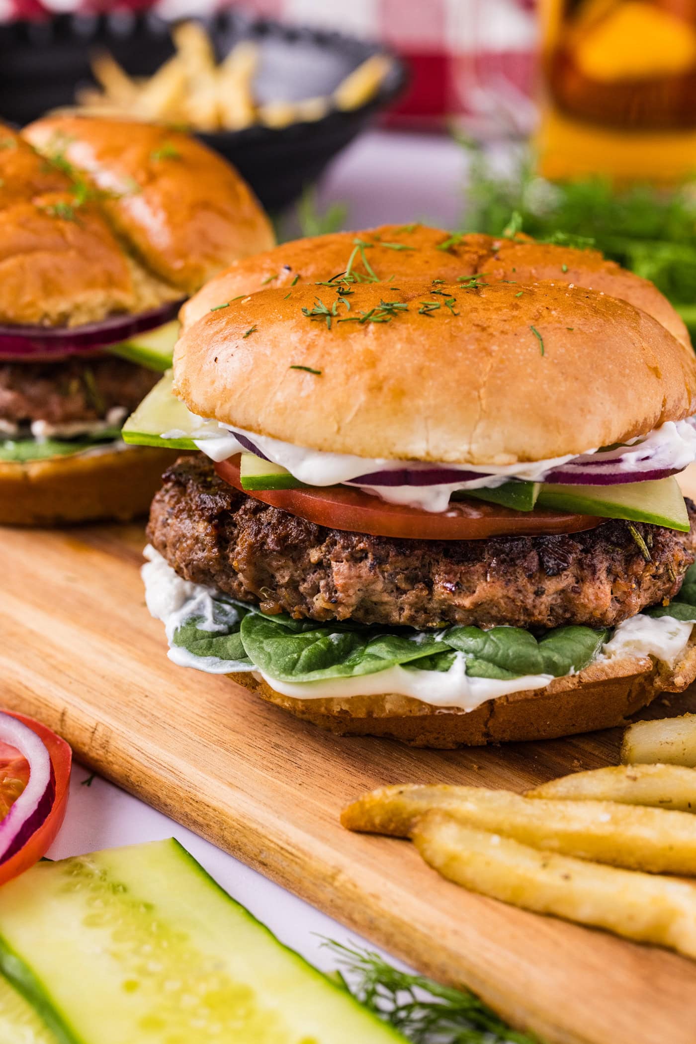 Close up photo of a Lamb Burger on a wooden board