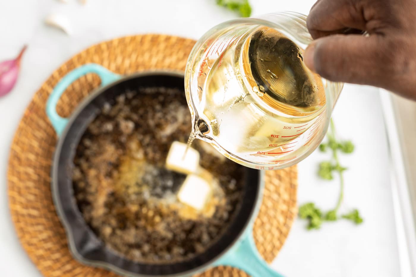 white wine reduction in a skillet