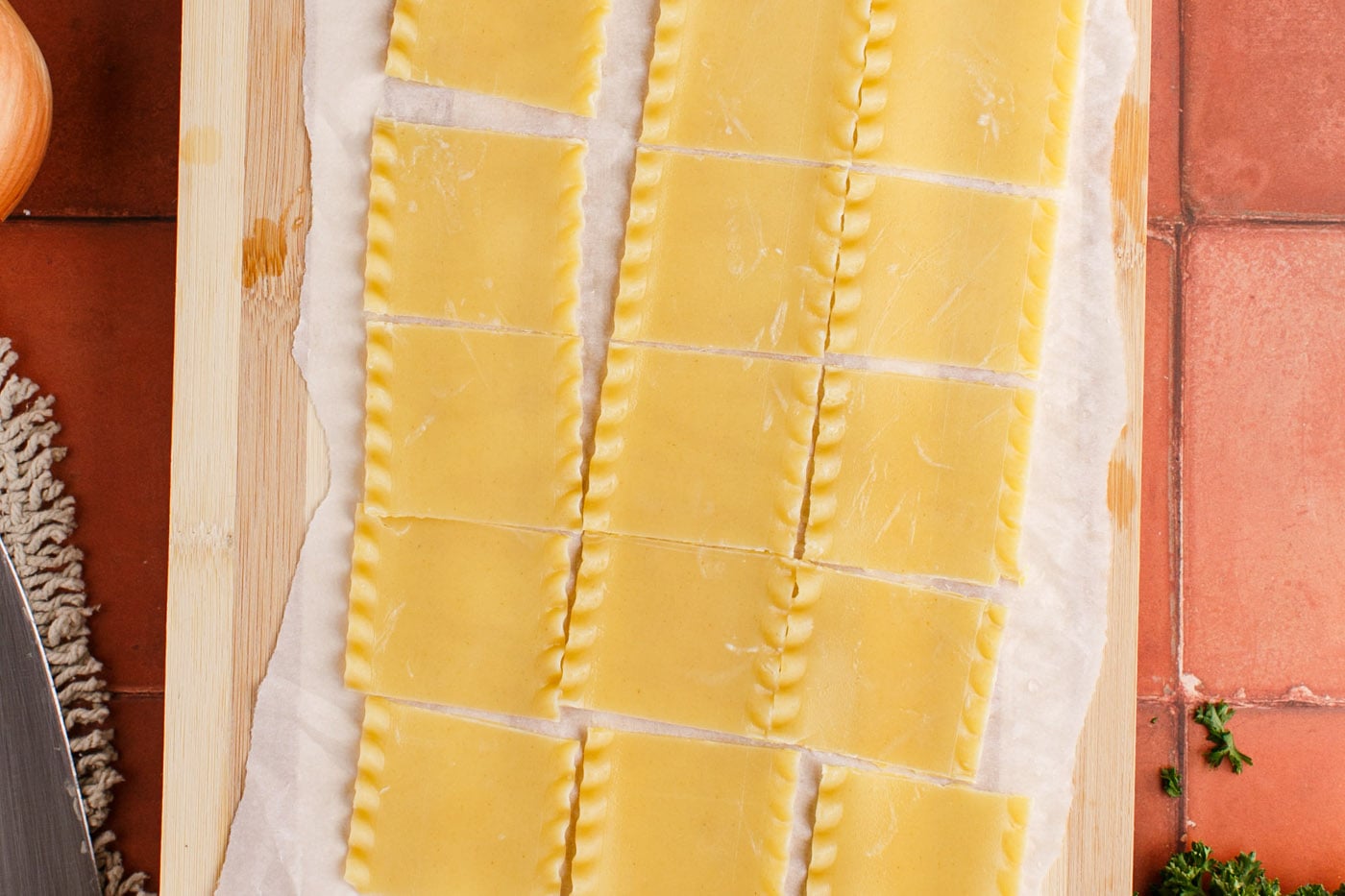 cutting lasagna noodles into small squares