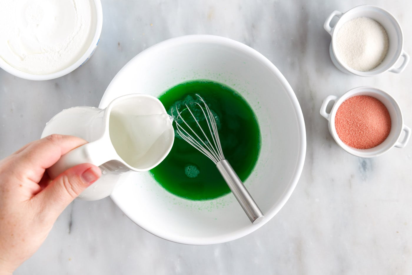 mixing jello powder with water